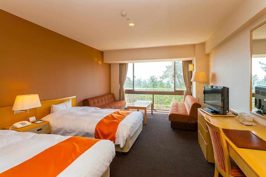 Suzu Beach Hotel Ruang foto